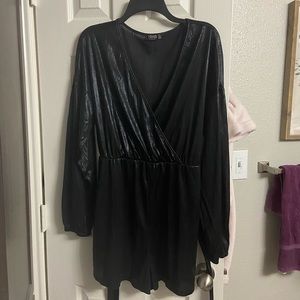 Shiny black low cut romper, with wrap around belt
